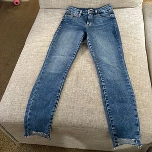 Good American high waisted raw hem skinny jeans